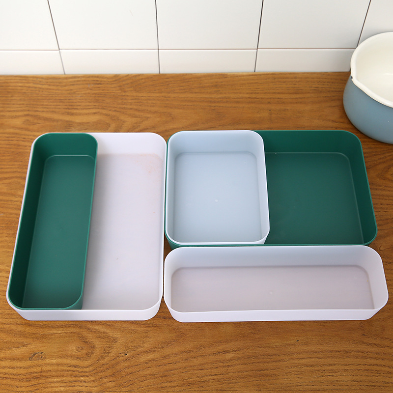 Contextual supplier image of multiple green and white drawer organizer trays; selected item is one white large tray