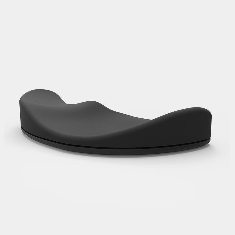Black curved wrist rest in a supplier product image